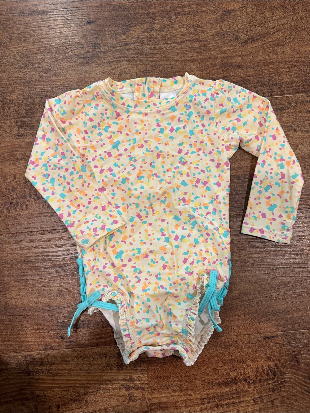 RuffleButts Confetti Beach Long Sleeve One Piece Rash Guard - 2T